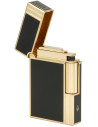 The metal lighter features a black-and-gold finish. When the top cover is opened, it produces a beautiful “ping” sound, characteristic of S.T. Dupont lighters. Turning the flint wheel to the left ignites the flame. On the bottom of the flint lighter, you will find the gas refill valve and the flame intensity control (on the left). To replace the flint, slide the top cover—the flint holder secured by a spring—slightly aside. Insert a new flint into the flint compartment and return the cover to its original position. The Eurojet lighter comes in a gift box.